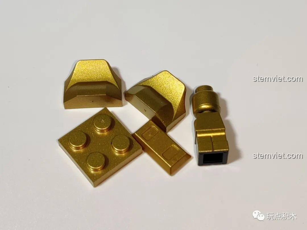 Các mảnh ghép màu vàng kim của bộ Cá Chép Hóa Rồng Pantasy 18001, chi tiết nhỏ nhưng tinh xảo.