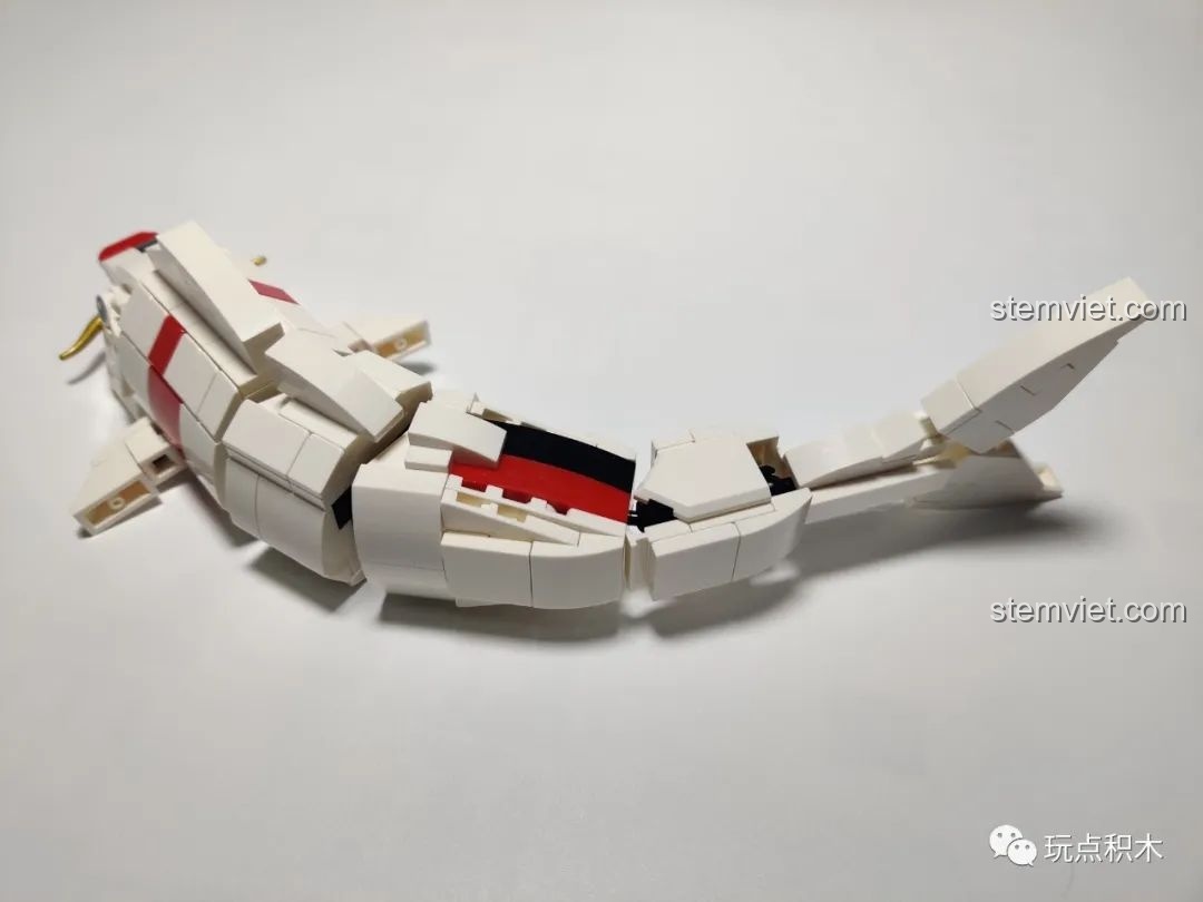 Nội dung túi số 7 của bộ lắp ghép Cá Chép Hóa Rồng Pantasy 18001, chứa các mảnh ghép nhân vật thư sinh.