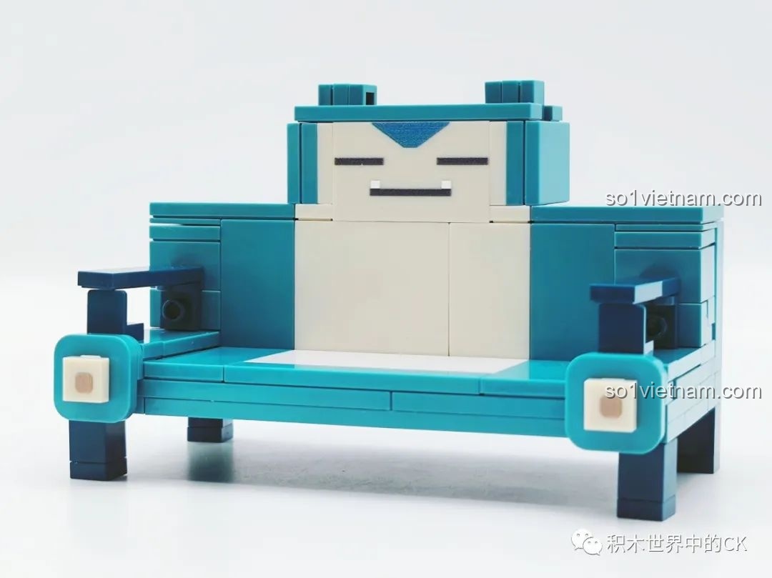 Cận cảnh Ghế Snorlax từ bộ lắp ghép QMAN 73014 Pokémon với khuôn mặt ngái ngủ đặc trưng, rất dễ thương và chi tiết.