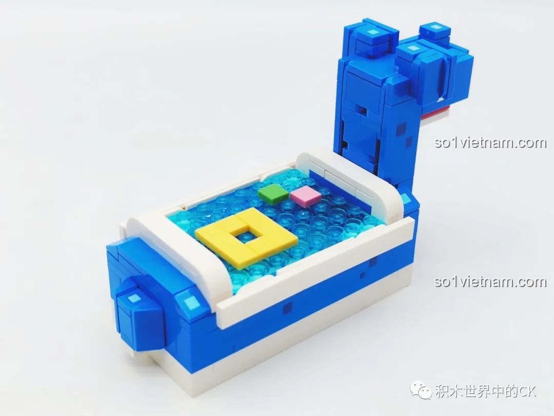 Hồ bơi Lapras với hiệu ứng nước lung linh và các khối màu sắc nổi bật, tạo điểm nhấn cho bộ lắp ghép QMAN 73014 Pokémon.