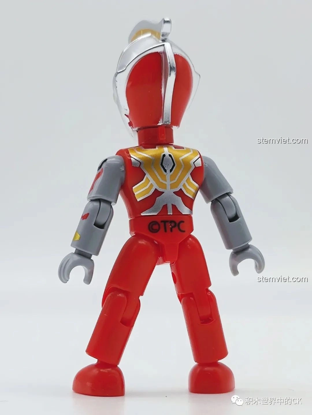 Mặt sau của mô hình Đặc Lợi Già Ultraman Cường Lực Hình (75025-7), hiển thị chi tiết in ấn và logo.