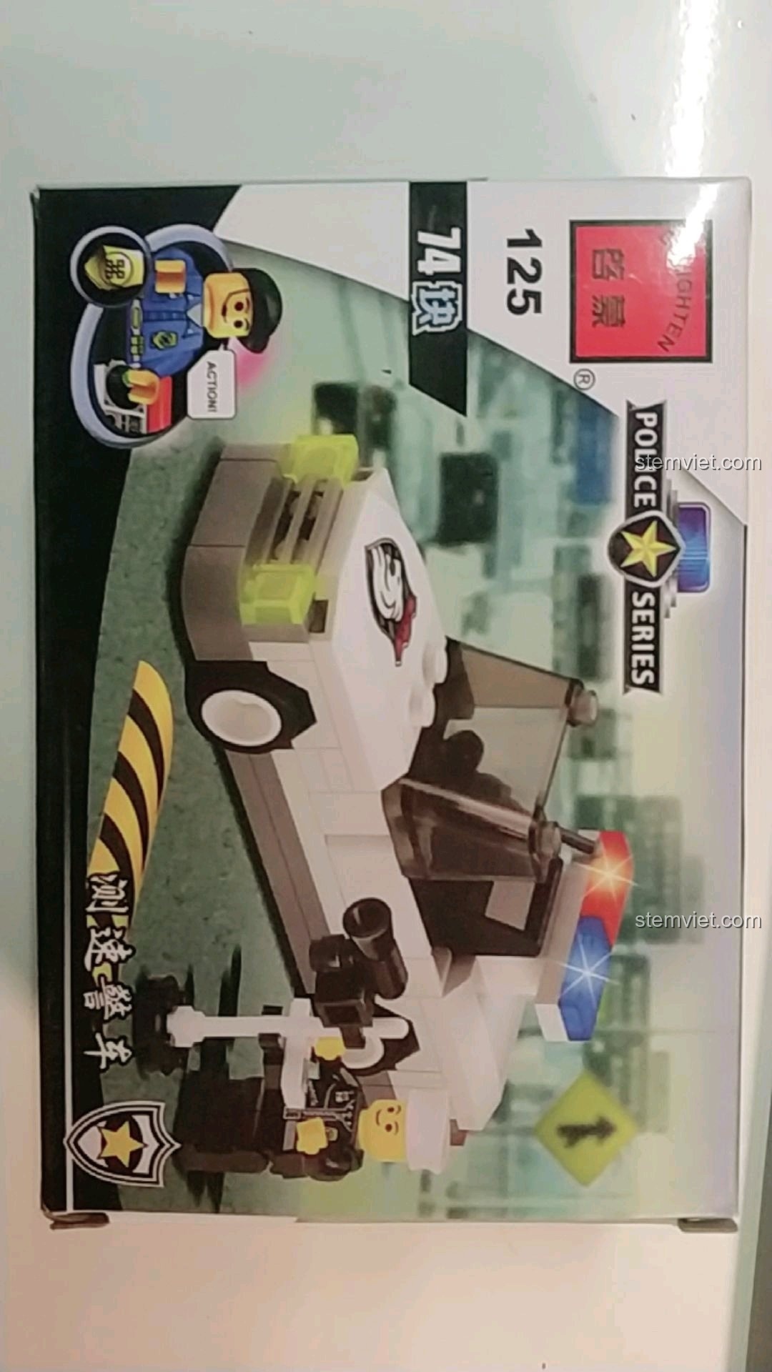 Mặt trước hộp bộ lắp ráp Enlighten 125 Xe Tuần Tra Giao Thông với hình ảnh sản phẩm hoàn thiện và nhân vật cảnh sát.