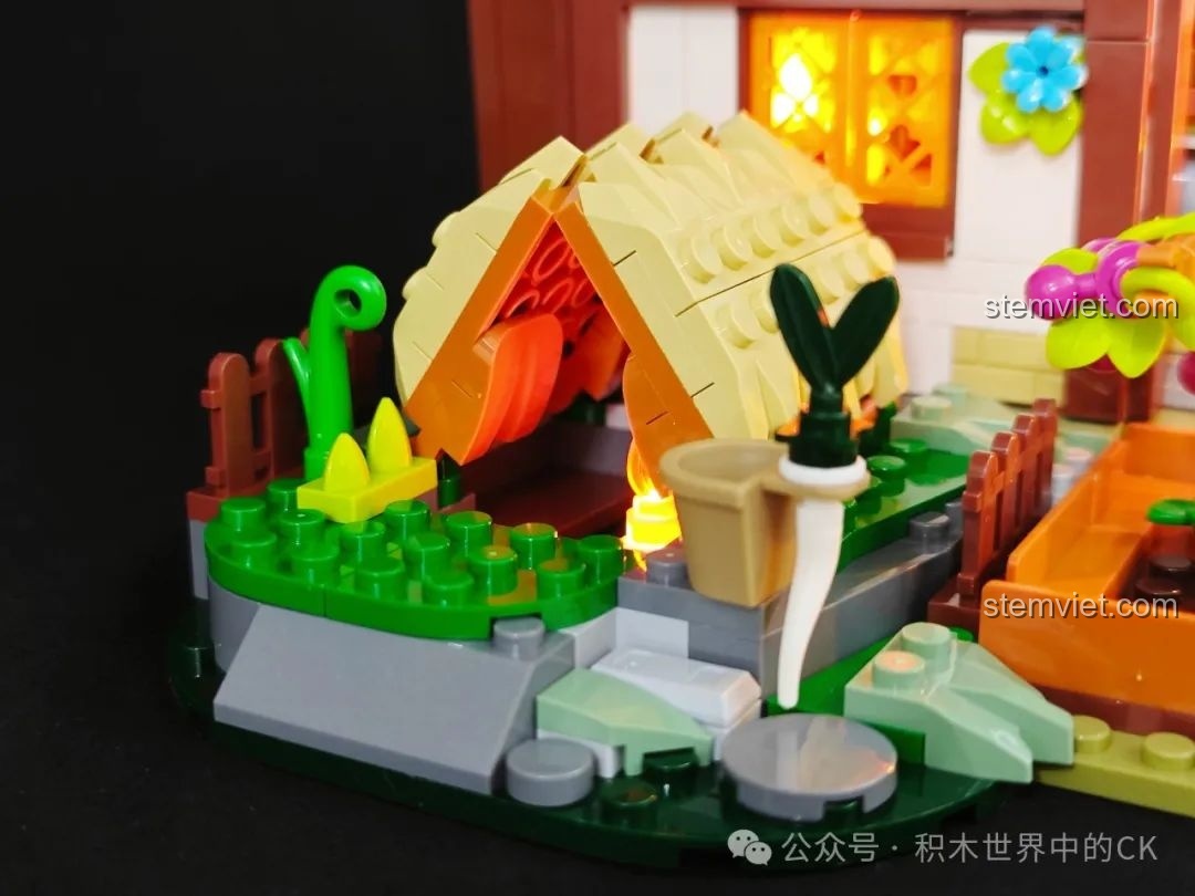 Nội thất tầng trên của bộ FunWhole F9024 Tiệm Thuốc Thời Trung Cổ với chiếc thang gỗ.