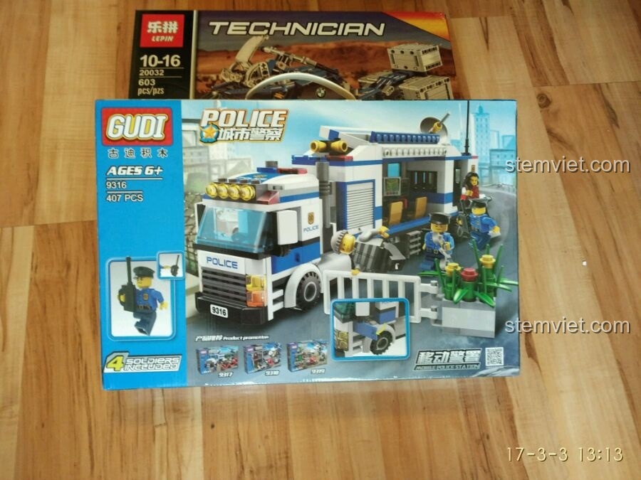 Hộp bộ xếp hình Xe Cảnh Sát Di Động GUDI 9316 với hình ảnh mô hình hoàn chỉnh và thông tin sản phẩm chi tiết.