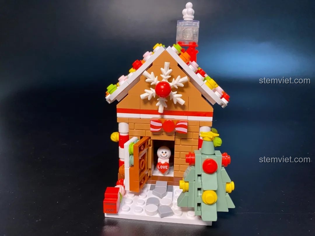 Mô hình đồ chơi lắp ráp JAKI JK5109 Ngôi Nhà Bánh Gừng hoàn thiện cùng hộp và sách hướng dẫn.