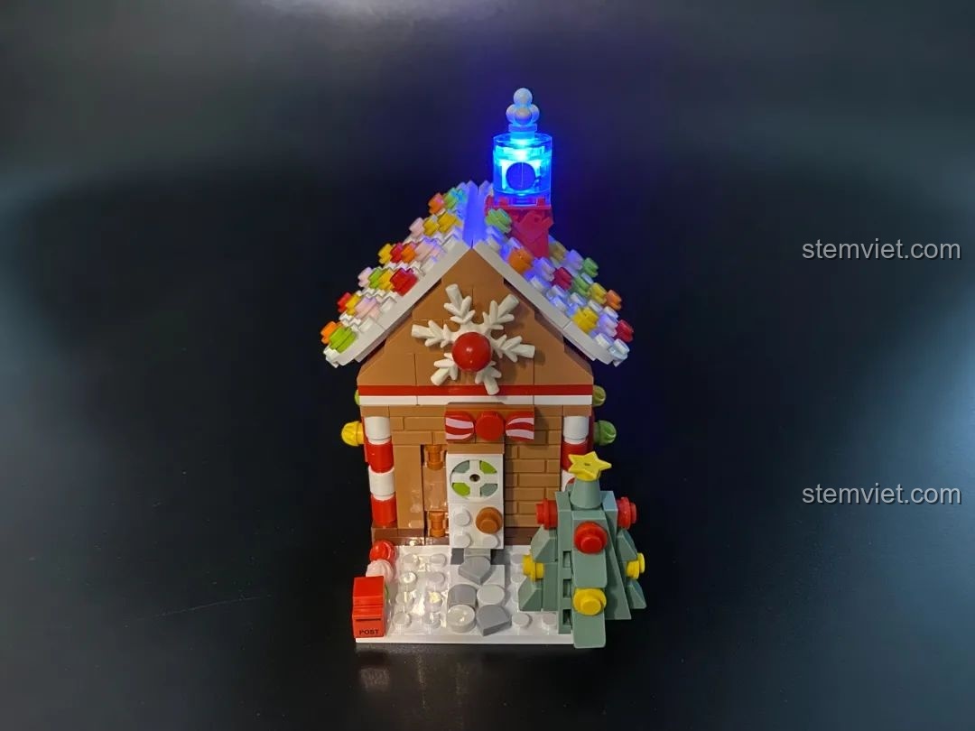 Trang đầu sách hướng dẫn lắp ráp JAKI JK5108 Gương Giáng Sinh với lời nhắn ý nghĩa từ nhà thiết kế.