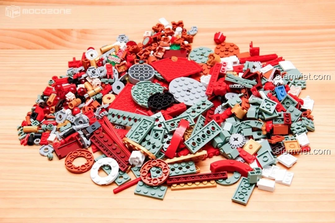 Toàn bộ 543 mảnh ghép của Hộp nhạc Giáng Sinh Xoay Tự Động JAKI JK1365 được đổ ra, màu sắc Giáng Sinh rực rỡ, chất liệu cao cấp.