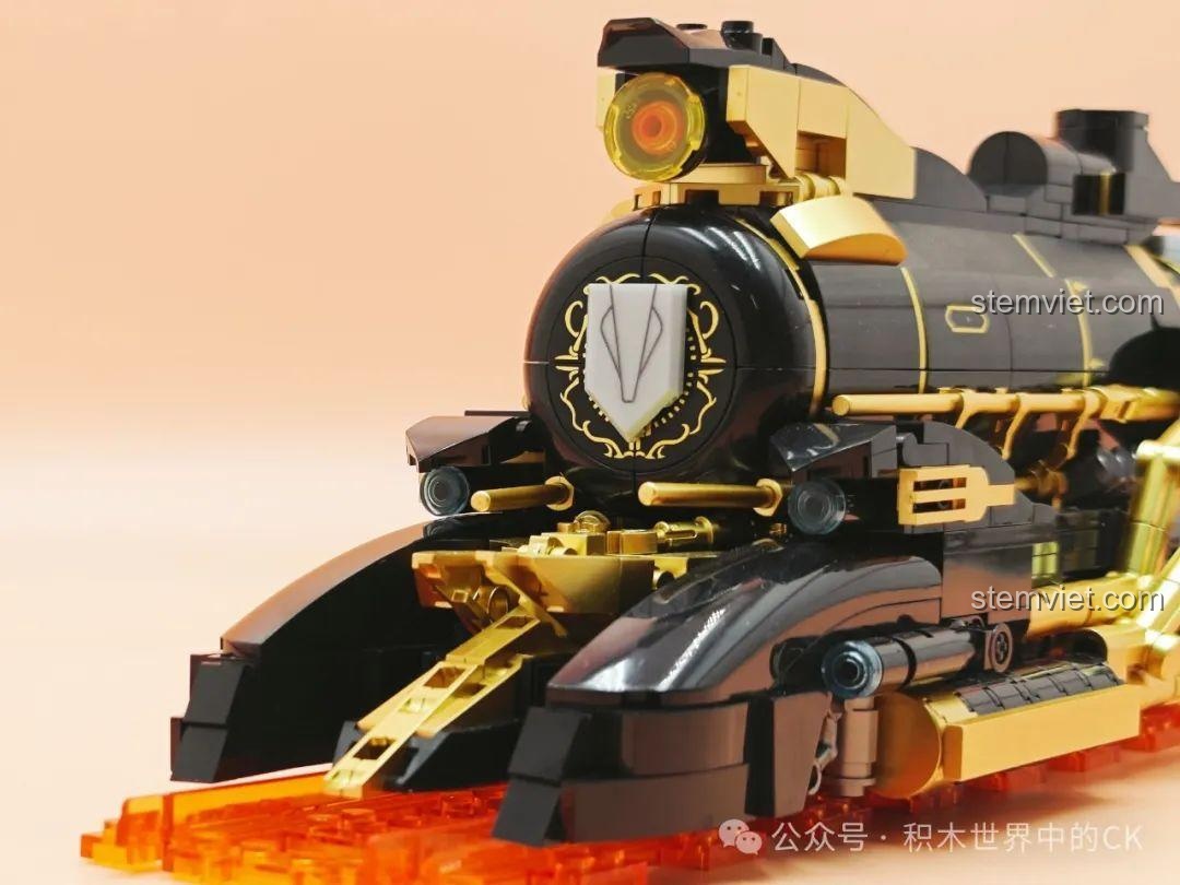 Cận cảnh các chi tiết màu vàng trên phần đầu của mô hình Tàu Sao Băng JIESTAR 58113, thể hiện độ hoàn thiện cao.