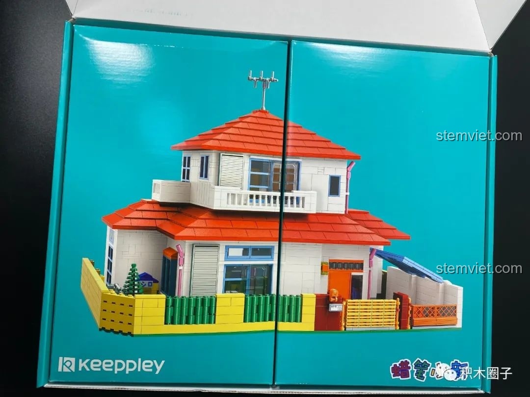 Mở hộp phụ bộ lắp ráp Keeppley K20612, để lộ hai hộp nhỏ hơn chứa các túi gạch bên trong.