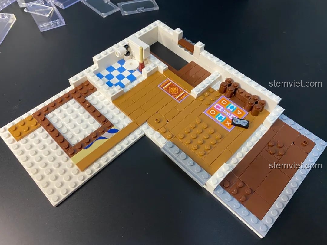 Chi tiết khu vui chơi với đàn guitar và hình in Taiko no Tatsujin trong bộ lắp ghép Keeppley K18002 Phố Cổ Trung Hoa, tạo không gian giải trí.