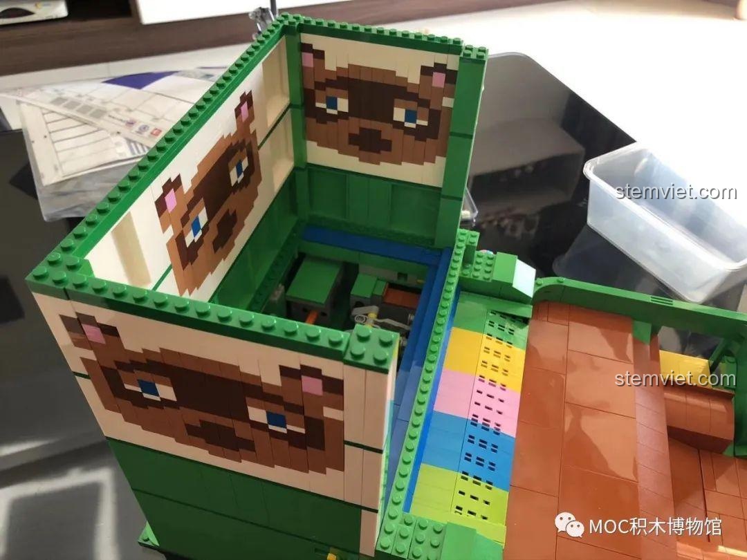 Chi tiết pixel art hình chú gấu mèo dễ thương trên thân Máy Đẩy Xu Điện Tử Super 18K K104, lấy cảm hứng từ Animal Crossing.