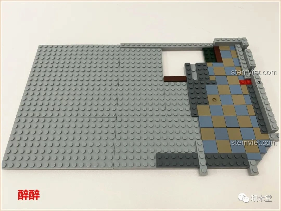 Khu vực bàn làm việc và tiếp khách trong tầng ba của bộ Panlos Brick 613001 Tòa nhà Sanctum Sanctorum Doctor Strange, với bàn, ghế và lò sưởi.