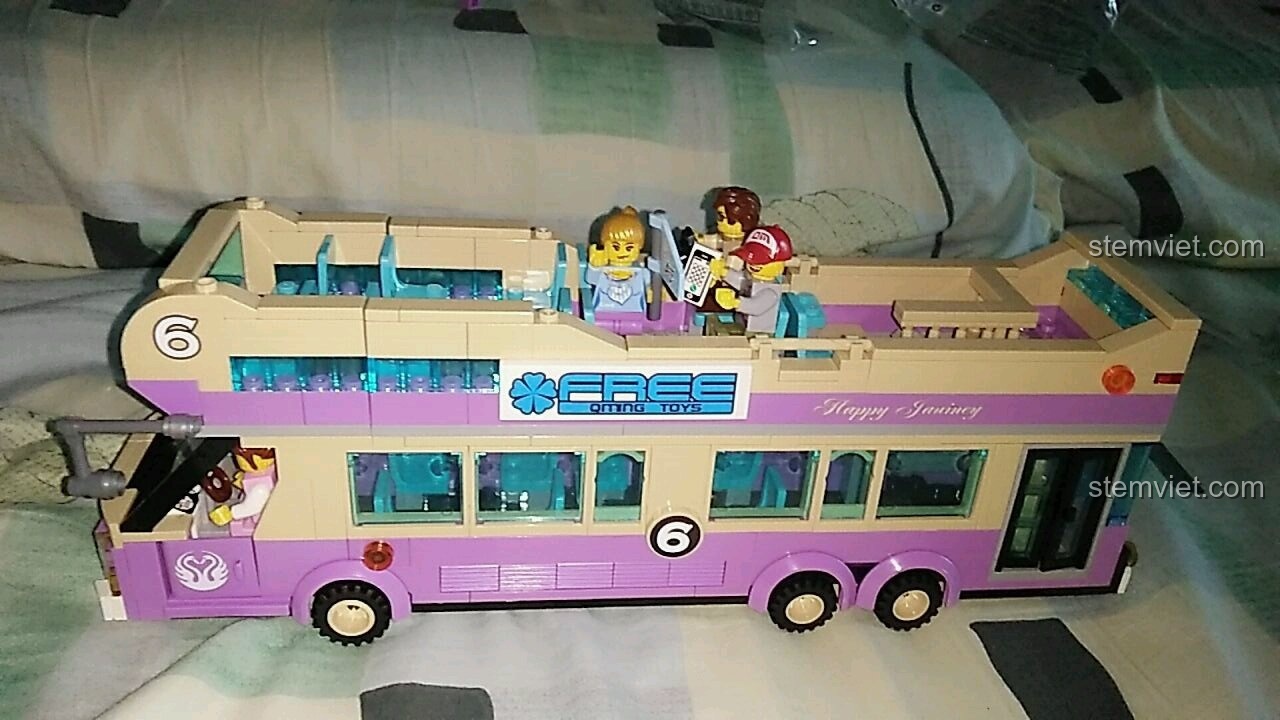 Minifigure hướng dẫn viên du lịch và hành khách trên xe buýt du lịch QMAN 1123.