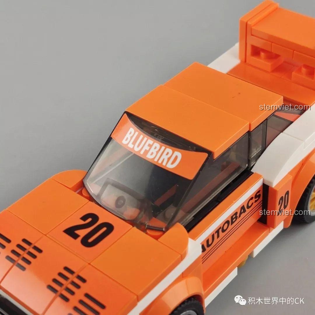 Mô hình xe đua Nissan KY910 Bluebird Super Silhouette 607061 màu cam với phần kính chắn gió tháo rời.