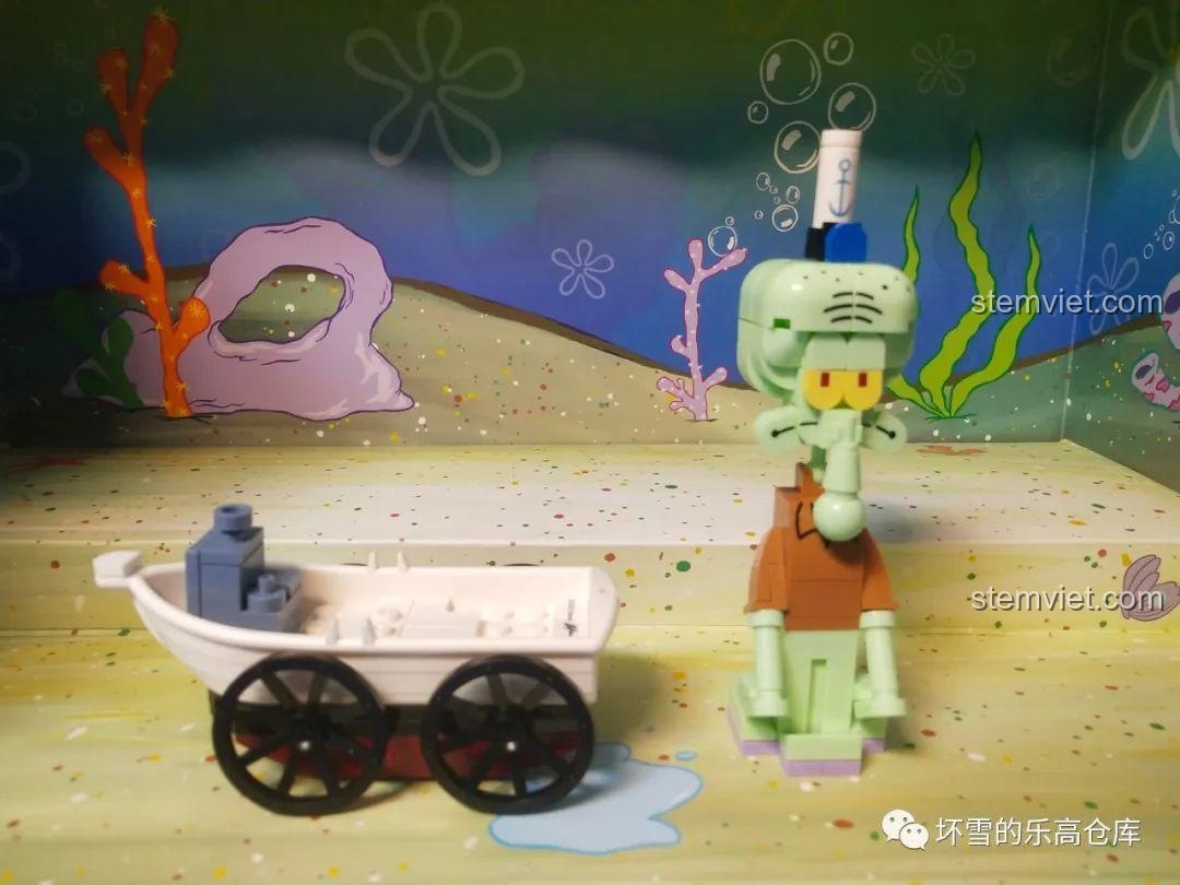 Mô hình Squidward ngồi trong thuyền thu ngân trong bộ lắp ráp Sembo 612211 Gia đình SpongeBob.