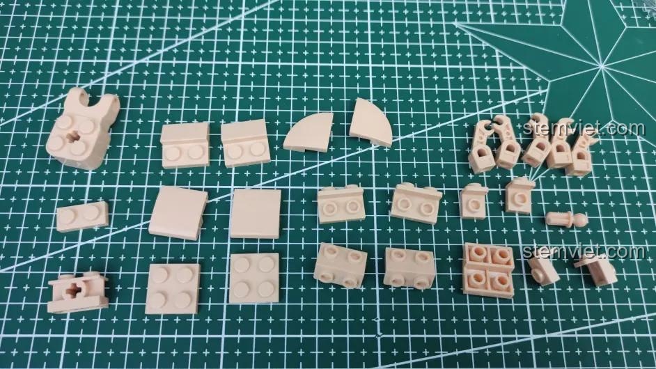 Tổng hợp các mảnh ghép màu da đa dạng của bộ lắp ghép Sluban M38-B1009 Mô hình Trư Bát Giới Phong Cách Hiện Đại, bao gồm nhiều hình dạng khác nhau.