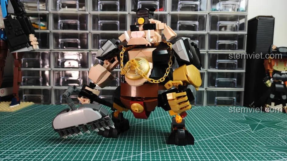 Tấm sticker của bộ lắp ghép Sluban M38-B1009 Mô hình Trư Bát Giới Phong Cách Hiện Đại, bao gồm tiền, huy hiệu và họa tiết.