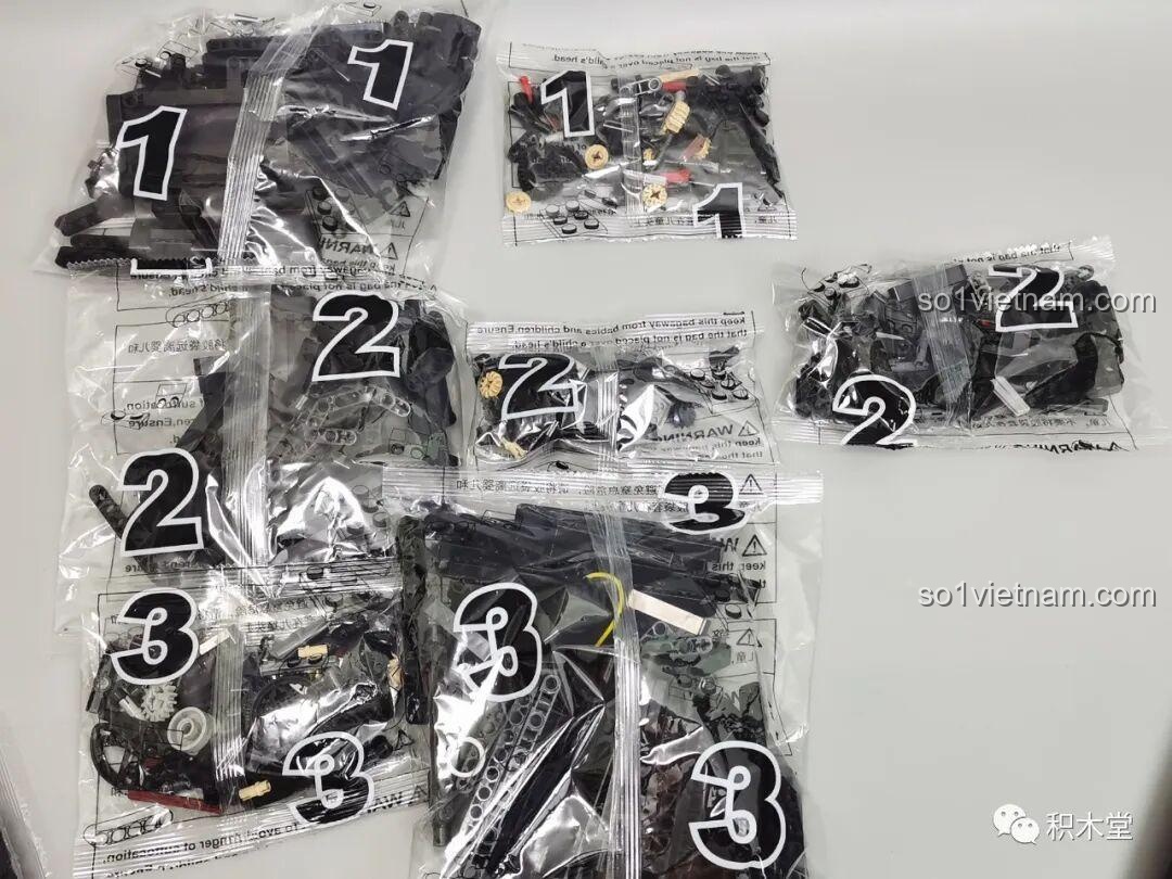 Các túi chi tiết được đánh số 1, 2, 3 của bộ đồ chơi lắp ráp Súng Gatling Taigao Le T2036, cho thấy sự phân loại rõ ràng giúp quá trình lắp ráp dễ dàng hơn.