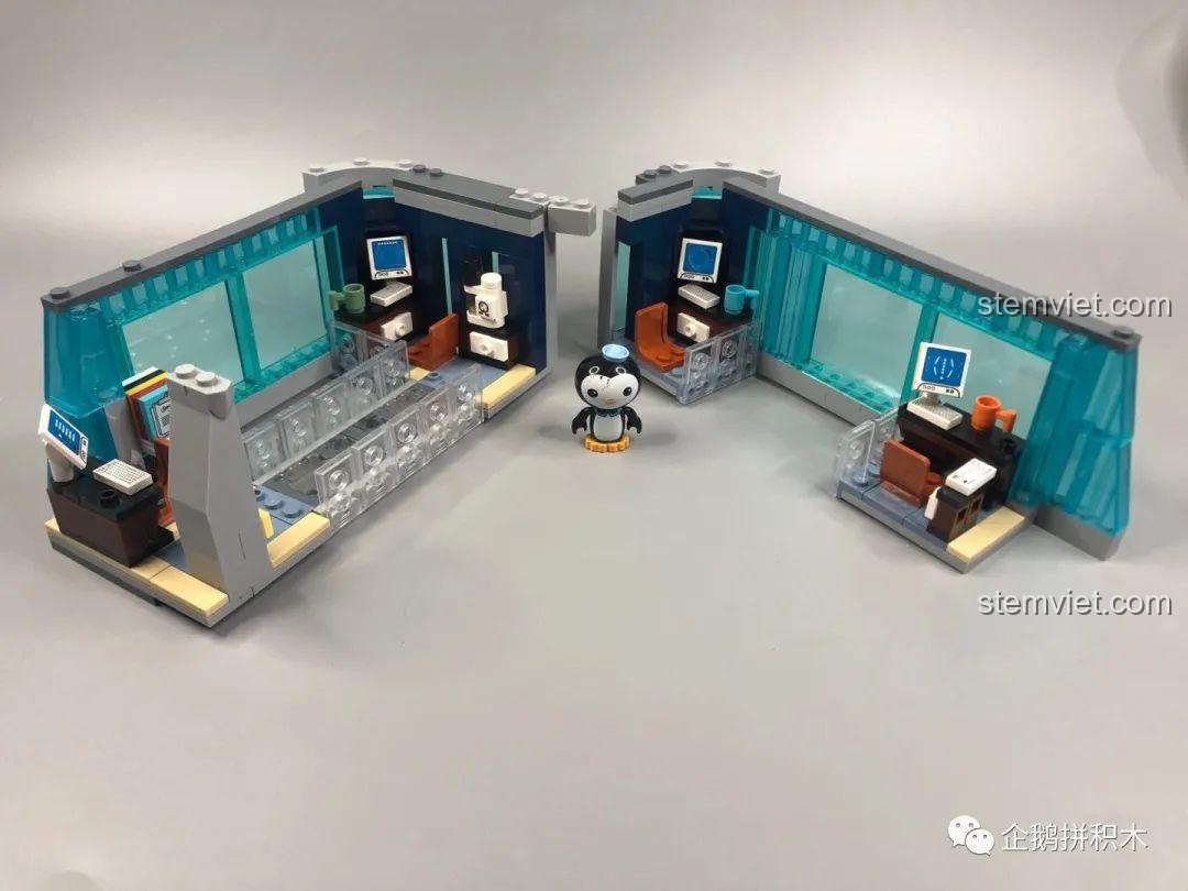 Cận cảnh bàn làm việc với màn hình máy tính và máy pha nước trong khu văn phòng của Tòa Tháp Avengers Taige 55120.