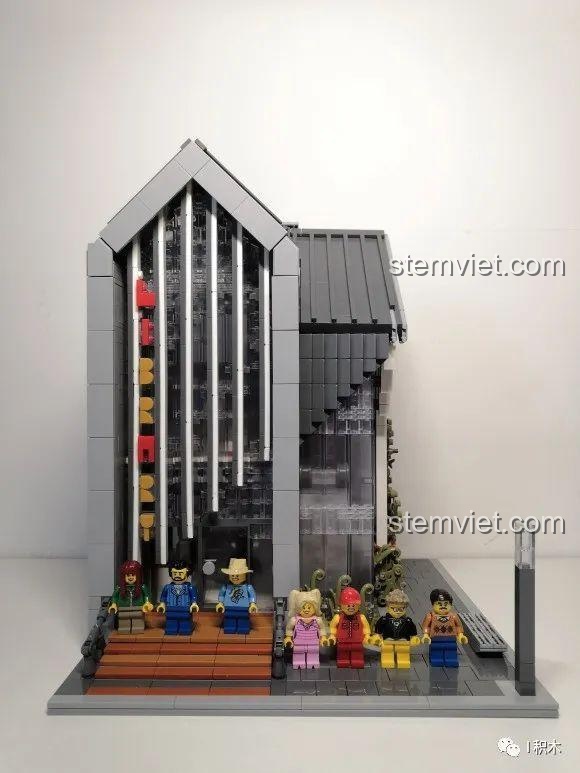 Mặt bên của mô hình Thư viện Hiện đại, với chi tiết tường gạch và cửa sổ.