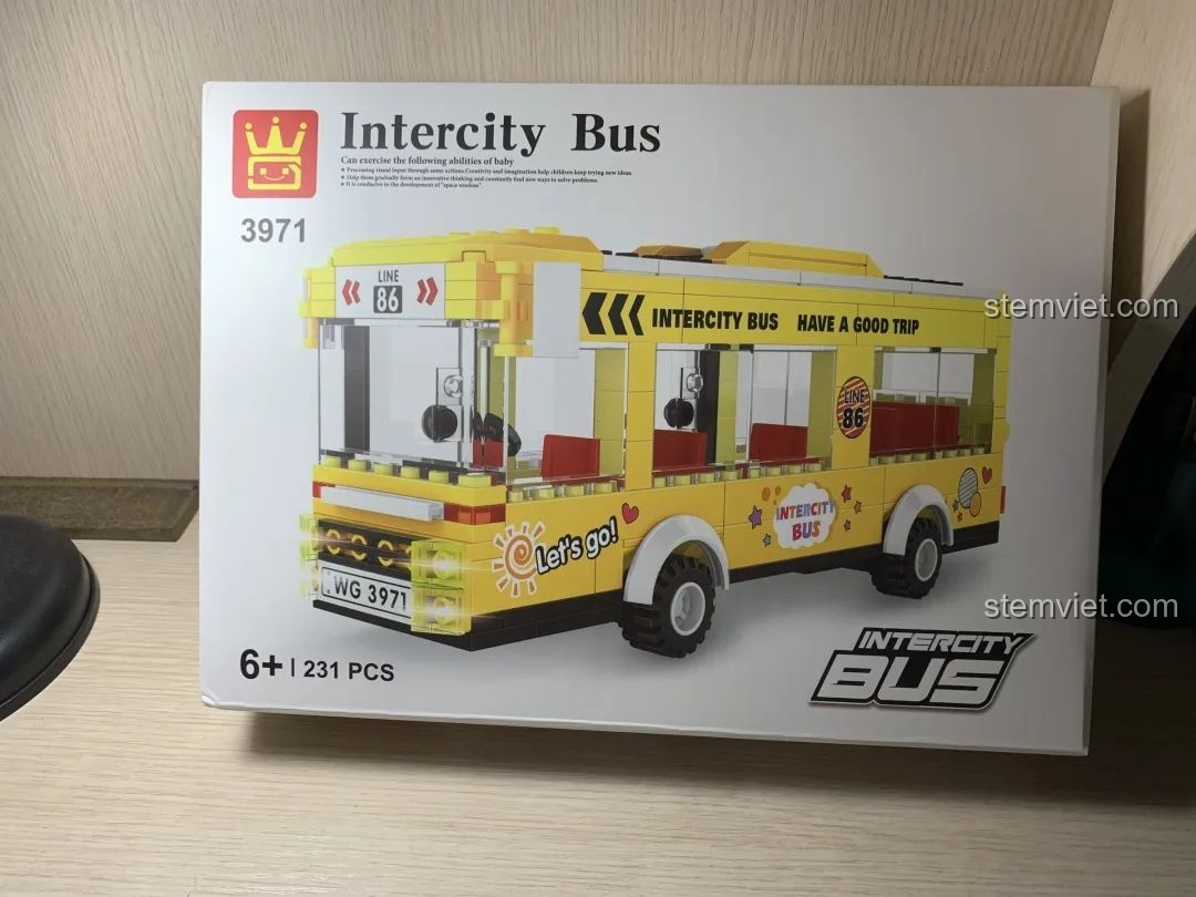 Hộp sản phẩm Xe buýt liên tỉnh WANGE 3971 với hình ảnh xe buýt màu vàng nổi bật, ghi rõ tên sản phẩm và số chi tiết.