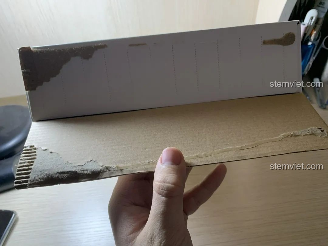 Mép hộp Xe buýt liên tỉnh WANGE 3971 bị niêm phong bằng keo nhiệt, cho thấy cách đóng gói.