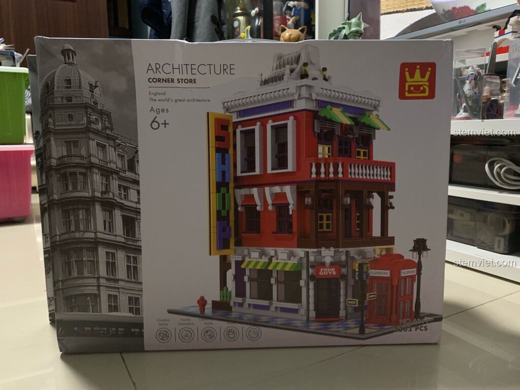 Hộp đồ chơi lắp ráp WANGE 6311 Cửa Hàng Góc Phố với hình ảnh mô hình kiến trúc đẹp mắt, thu hút sự chú ý của bé.