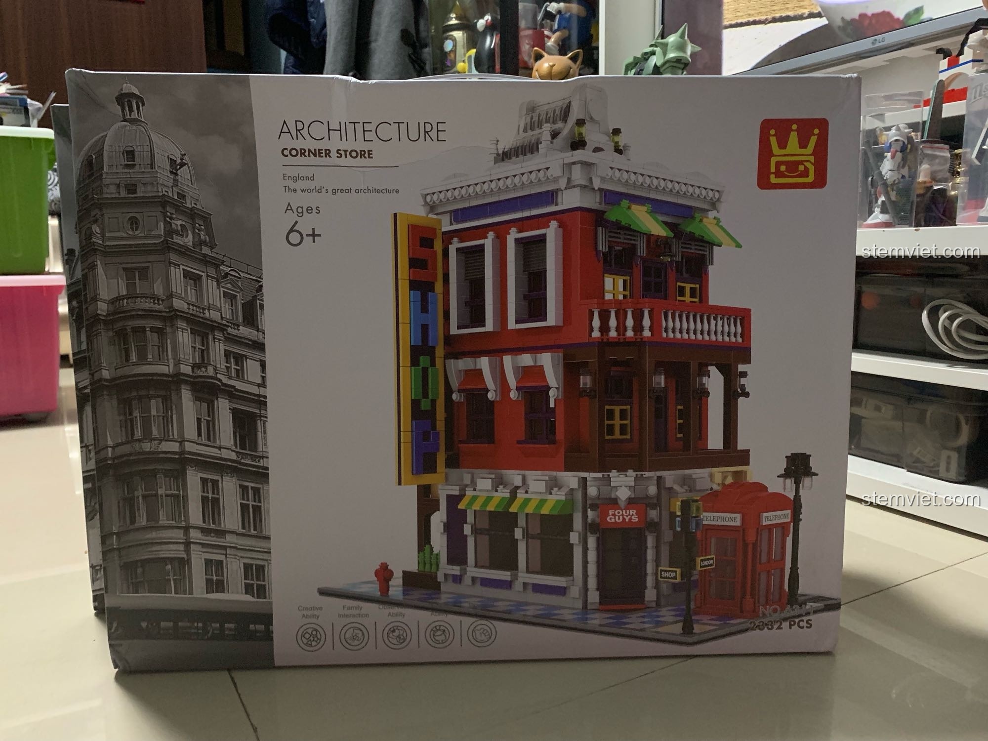 Hộp đồ chơi lắp ráp WANGE 6311 Cửa Hàng Góc Phố với hình ảnh mô hình kiến trúc đẹp mắt, thu hút sự chú ý của bé.
