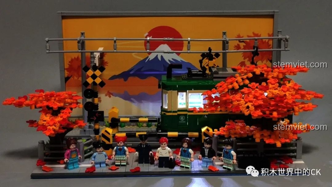 Góc nhìn từ phía sau các minifigures nữ và nhân viên nhà ga của bộ Wekki 506000.