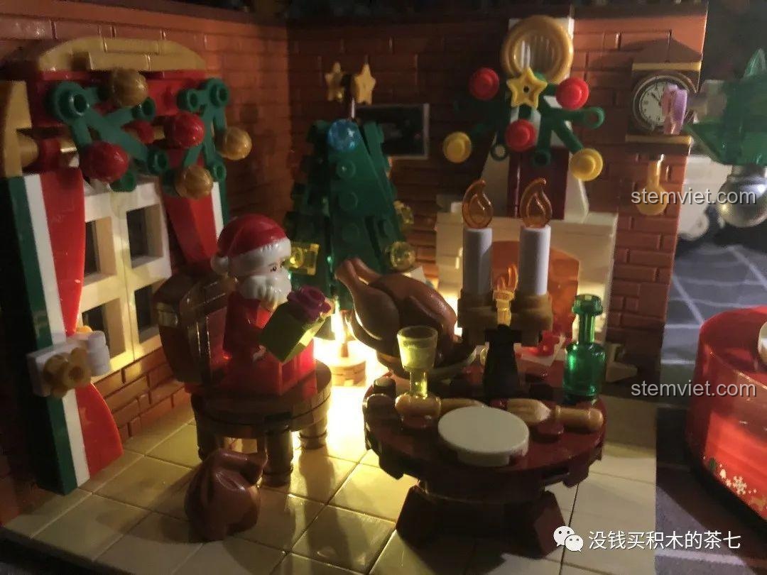 Mô hình Wekki 506001 Ngôi Nhà Giáng Sinh trong bóng tối với ánh sáng đèn LED nguyên bản.