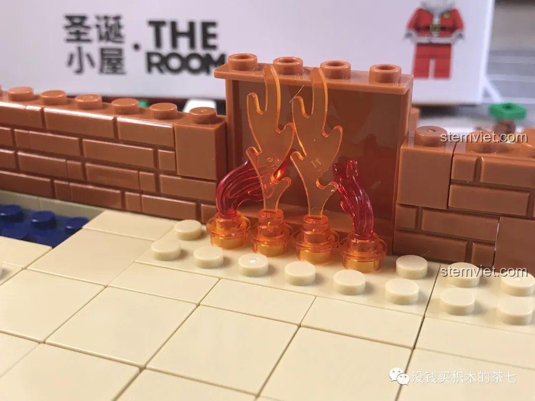 Chi tiết ngọn lửa trong lò sưởi của bộ lắp ráp Wekki 506001 Ngôi Nhà Giáng Sinh.