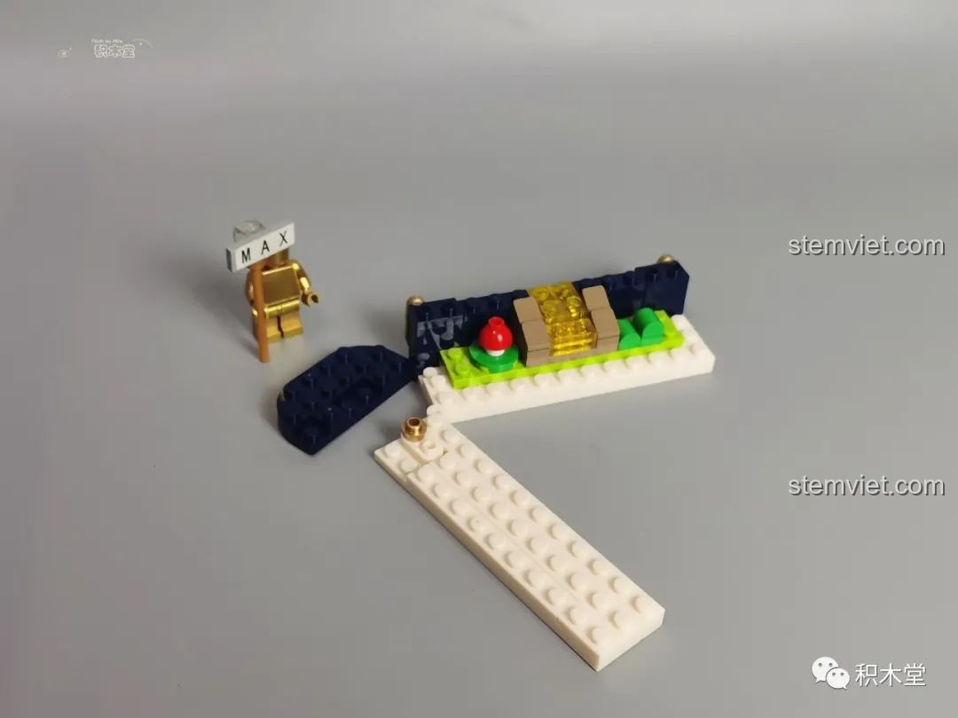 Giai đoạn đầu của quá trình lắp ráp bộ Wekki 506172 Sách truyện Alice ở xứ sở thần tiên, tạo nền cho cảnh quan.