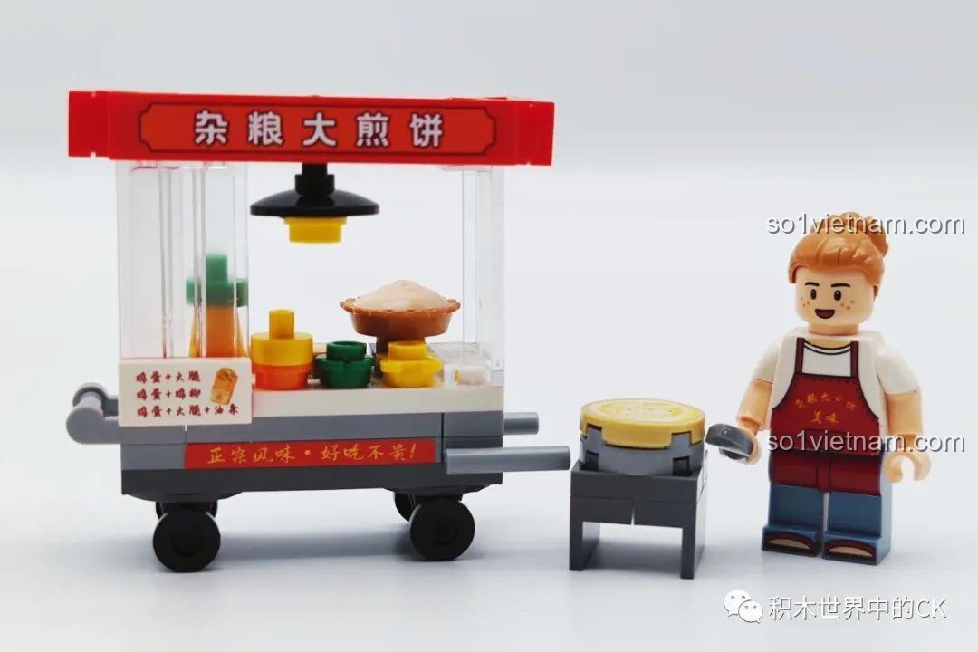 Đánh giá Wekki 516952B Quầy Bánh Rán: Mô hình quầy bánh rán đã lắp hoàn chỉnh cùng minifigure người bán hàng.