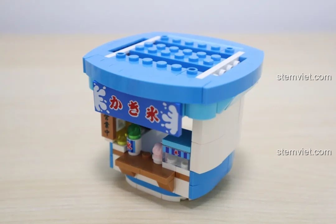 Hai nhân vật minifigure chủ tiệm刨冰 từ bộ lắp ráp Wekki So Good Little Shop Series 2, với trang phục truyền thống.