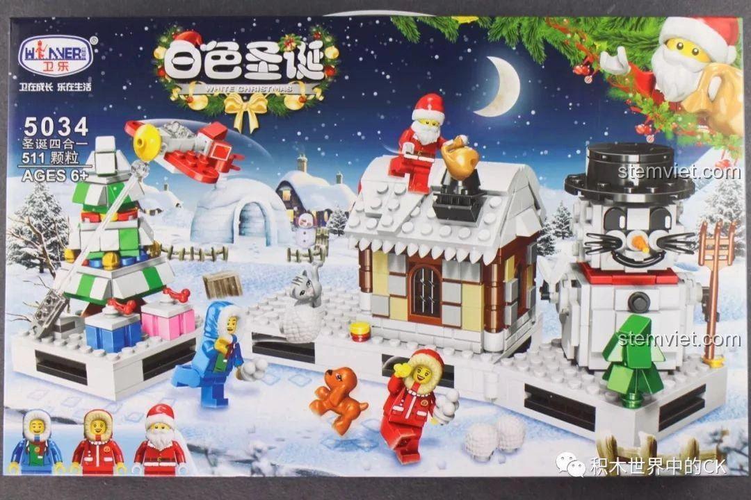 Hộp bộ lắp ráp Winner 5034 Giáng Sinh Trắng 4 trong 1 với hình ảnh ngôi làng tuyết, người tuyết và cây thông Noel rực rỡ.
