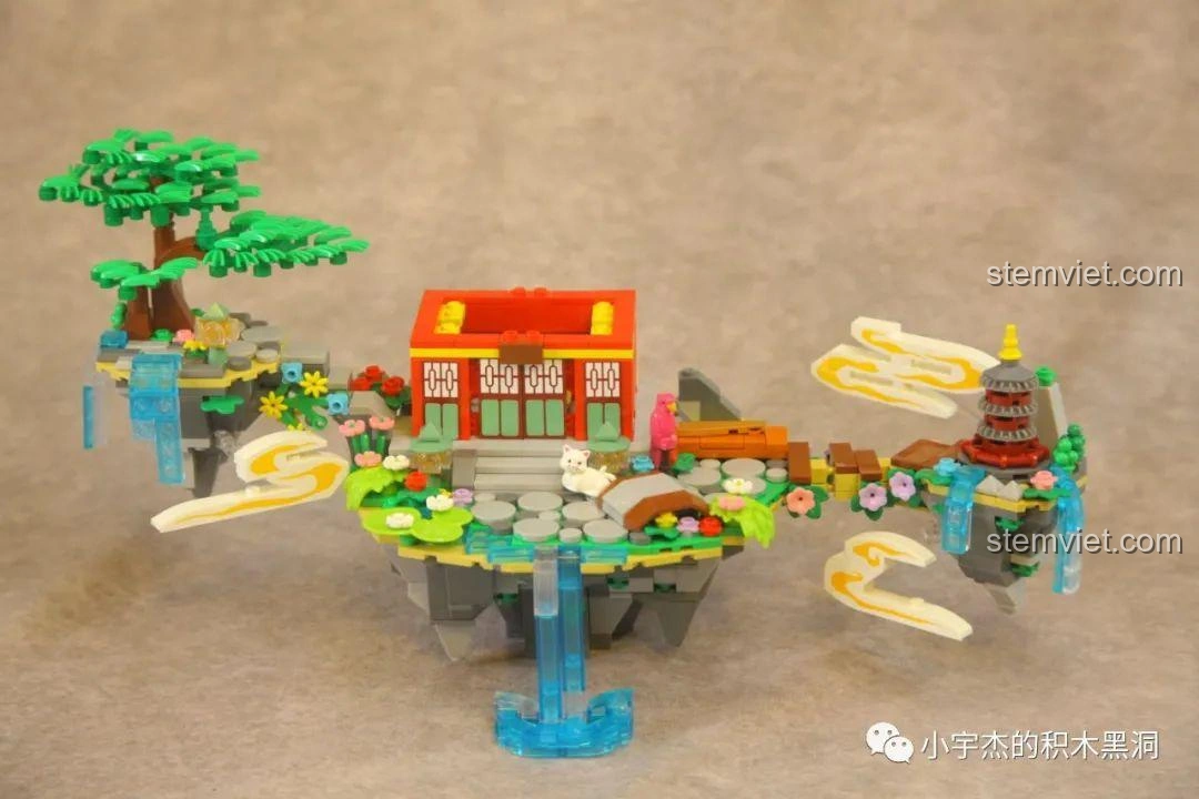 Tòa tháp nhỏ trong bộ lắp ráp WOMA C0349 Túy Hoa Các đang được xây dựng, với chi tiết mái ngói và cửa sổ tinh xảo.