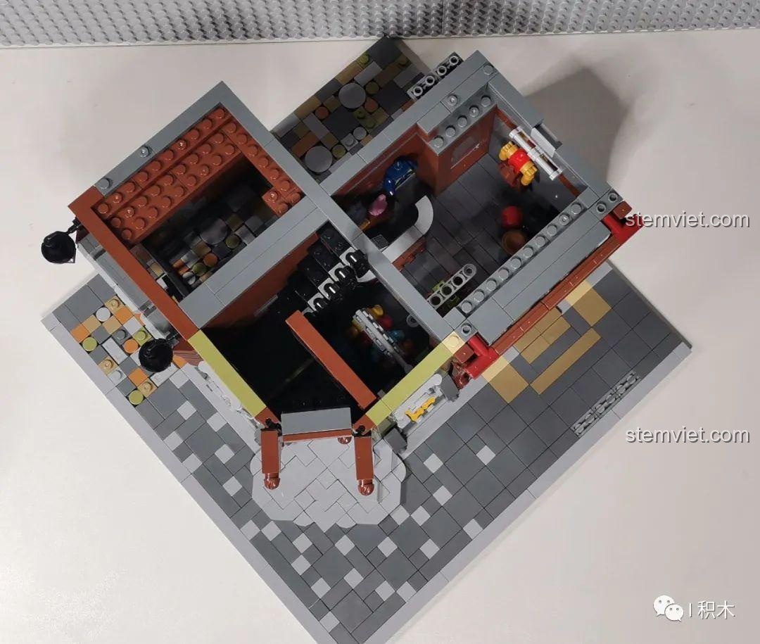 Góc nhìn từ trên xuống tầng 1 của bộ Tòa Nhà Góc Phố Đa Năng Zhe Gao QL0919, cho thấy bố cục không gian.