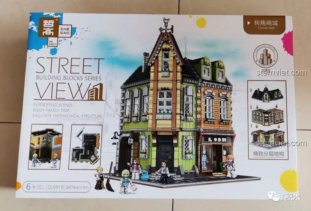Hộp màu chính của bộ lắp ghép Tòa Nhà Góc Phố Đa Năng Zhe Gao QL0919, với hình ảnh mô hình hoàn chỉnh và thông tin sản phẩm.