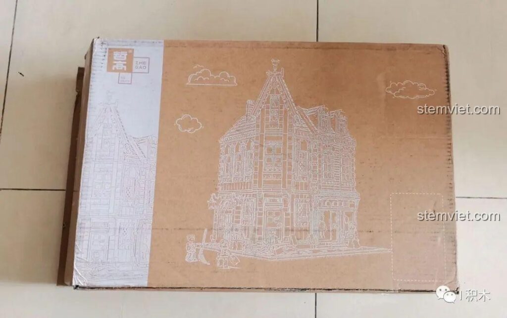 Hộp carton bên ngoài của bộ lắp ghép Tòa Nhà Góc Phố Đa Năng Zhe Gao QL0919, với hình vẽ phác thảo tinh tế của tòa nhà.