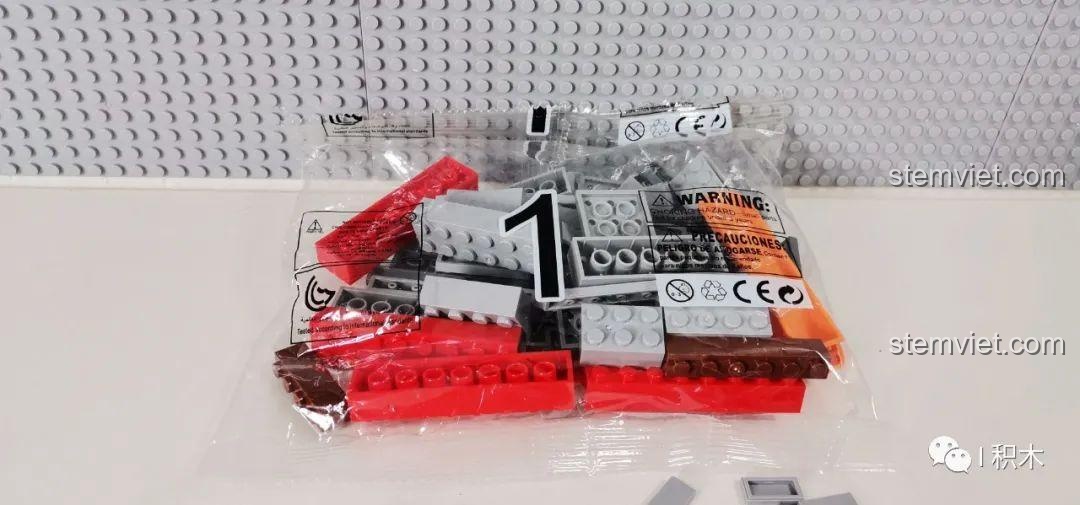 Túi chi tiết số 1 của bộ lắp ghép Tòa Nhà Góc Phố Đa Năng Zhe Gao QL0919, với số in rõ nét trên bao bì.