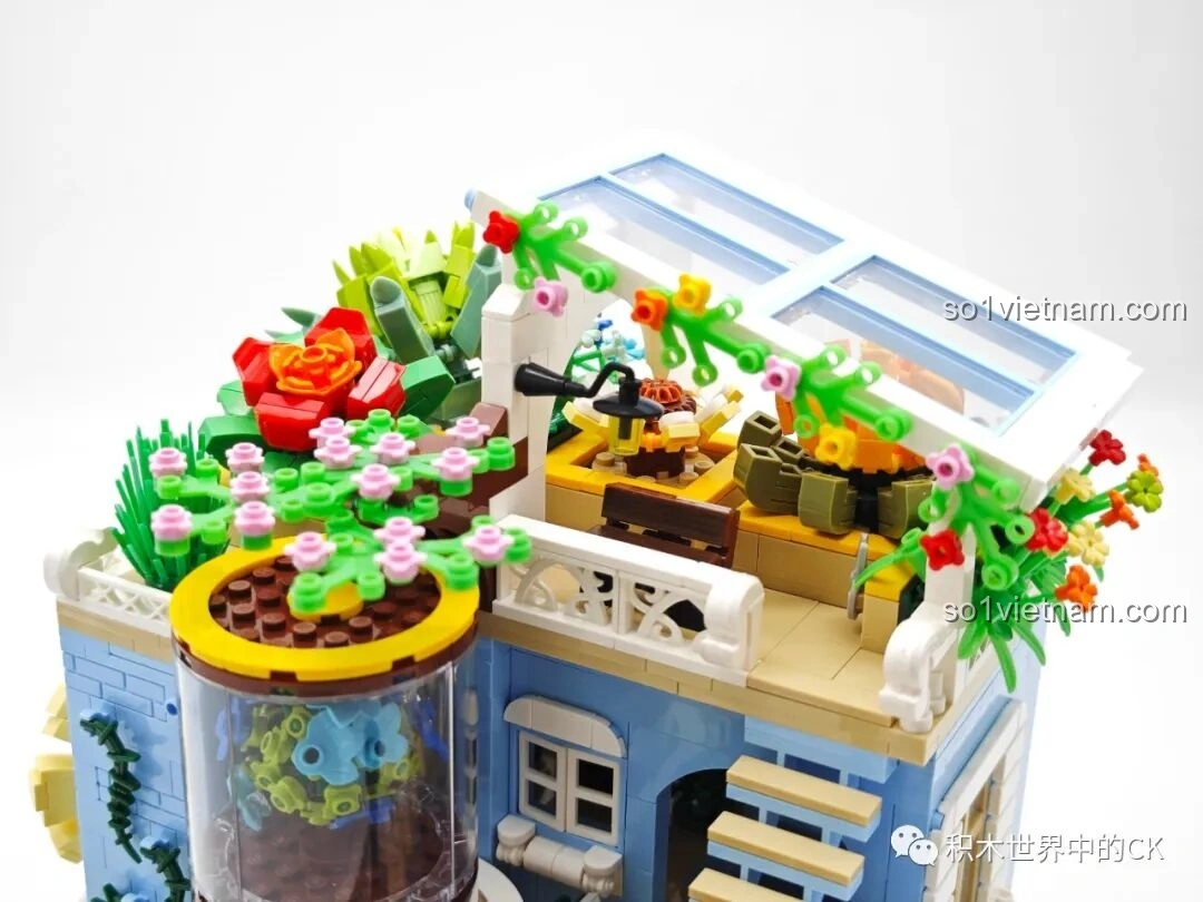 Cận cảnh các chậu cây mọng nước và hoa lá rực rỡ trên sân thượng của ZHEGAO DZ6120 Tiệm cây cảnh mọng nước.