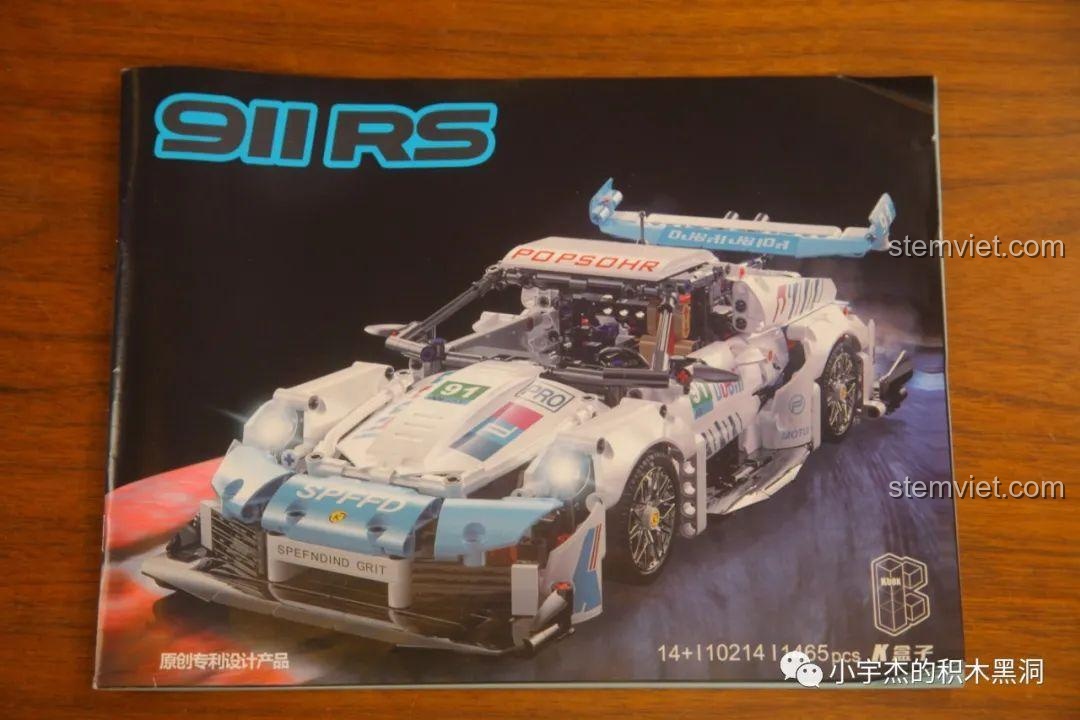 Sách hướng dẫn lắp ráp của bộ KBOX 10214 với hình ảnh mô hình Porsche 911 GT3 RS trên bìa.