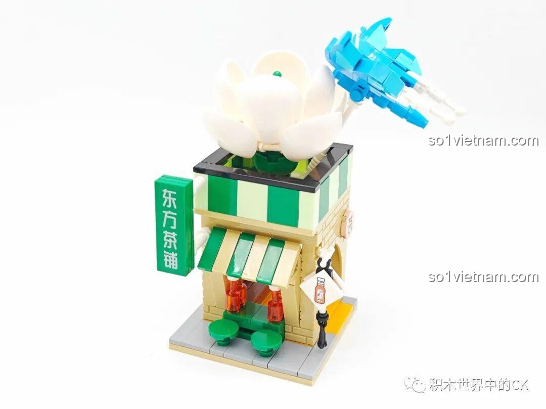 Chi tiết các mảnh ghép màu xanh lá và trắng trên mái hiên tiệm trà SEMBO 301094 Oriental Leaf