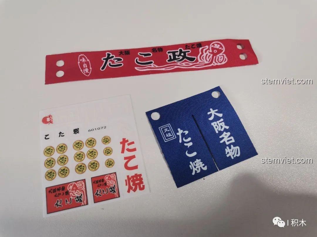 Các chi tiết vải và miếng dán UV độc đáo của bộ lắp ráp Cửa hàng Takoyaki Osaka SEMBO 601072, tạo điểm nhấn chân thực.