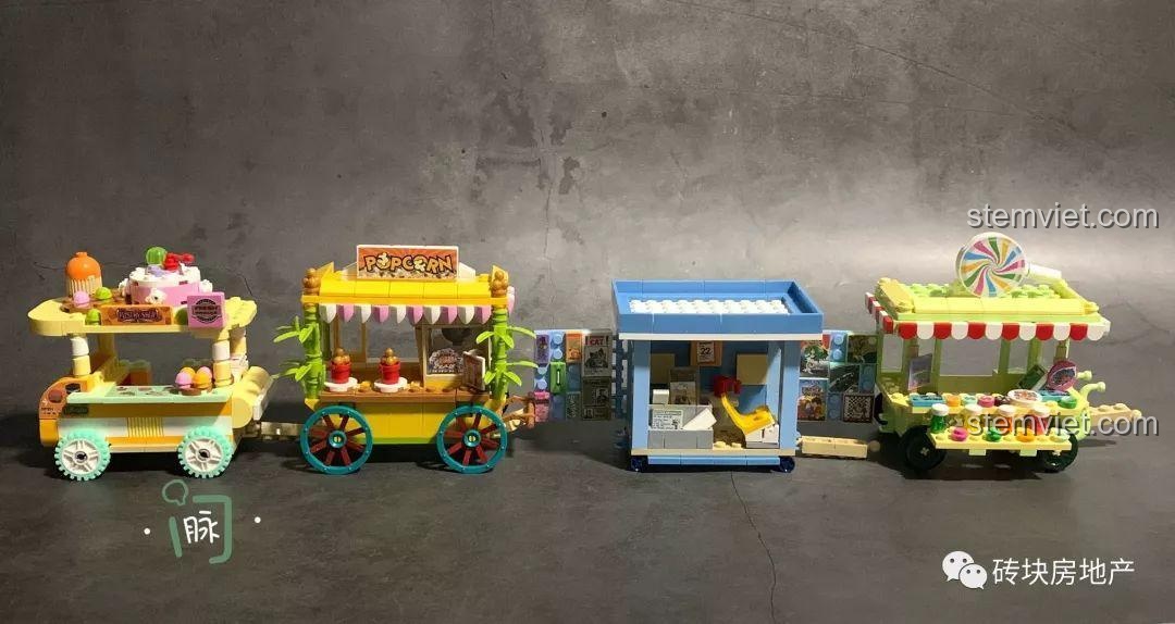 Bộ 4 Xe Đẩy Bán Hàng Rong Mini Sembo 601109, 601110, 601111, 601112 được trưng bày cùng nhau, tạo thành một khu phố ẩm thực.