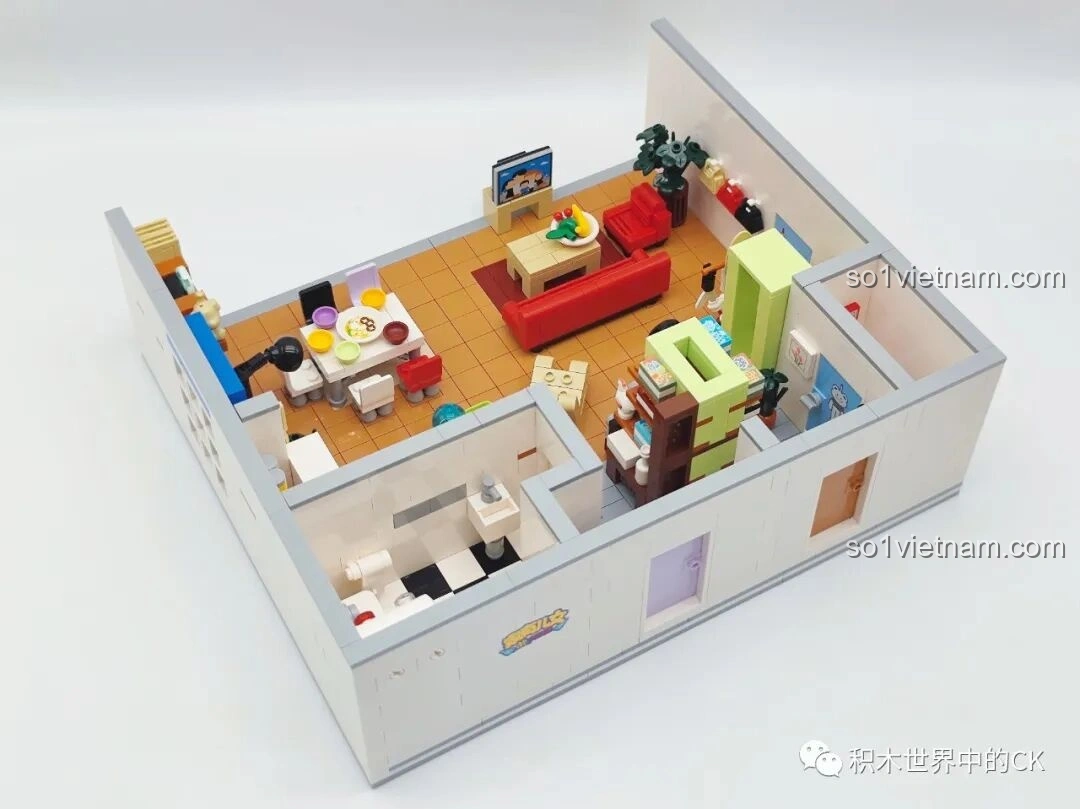 Chi tiết phòng khách với sofa đỏ và bàn trà trong đồ chơi xếp hình Căn hộ Gia Hữu Nhi Nữ SEMBO 601310.