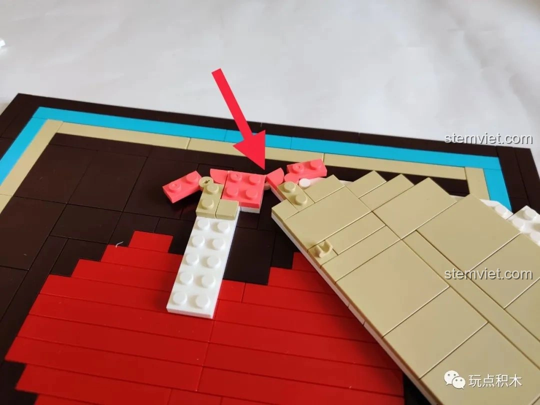 Cận cảnh điểm nối nhỏ trong quá trình lắp ráp Sembo 601400 Bánh Kem Hộp Quà