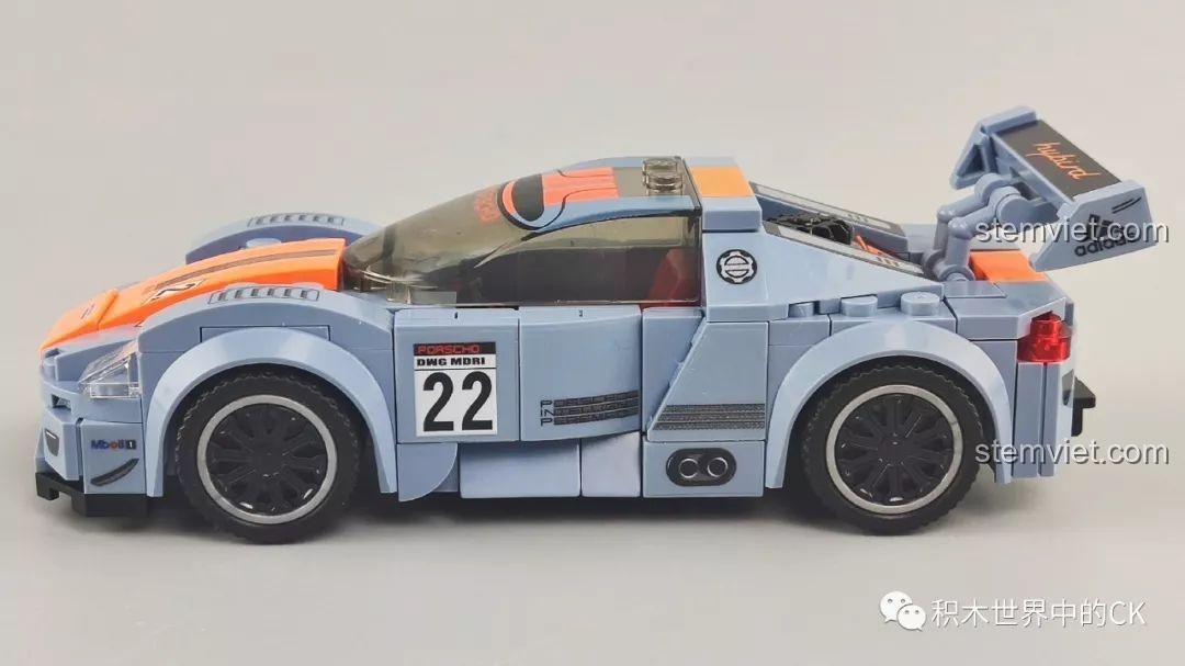 Góc nhìn ngang của mô hình xe đua màu xám cam Sembo 607050, thể hiện cánh gió lớn.