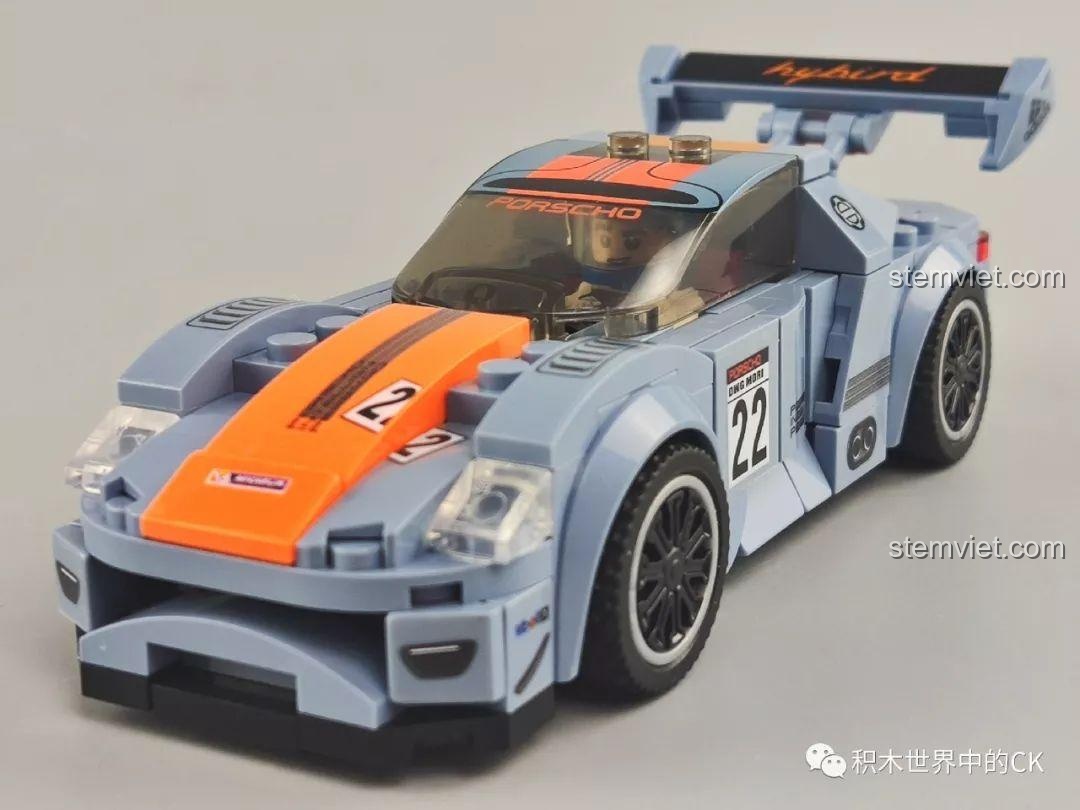 Mô hình xe đua màu xám cam Sembo 607050, minifigure tay đua và khung vành bánh xe dự phòng.