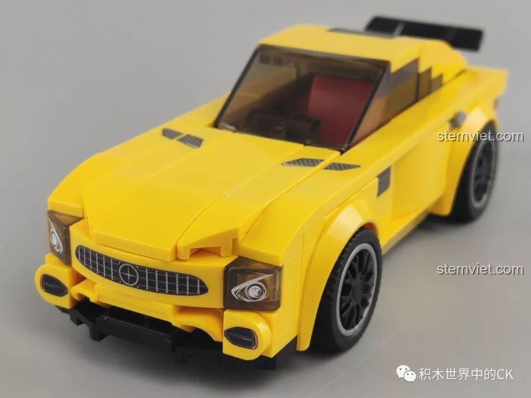 Cận cảnh phần đầu xe của mô hình xe đua màu vàng Sembo 607052, với lưới tản nhiệt và đèn pha.